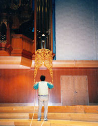 Jude Fritts raising the large PLU carving, Fritts pipe organ, Pacific Lutheran University, Tacoma WA, wood carver Jude Fritts